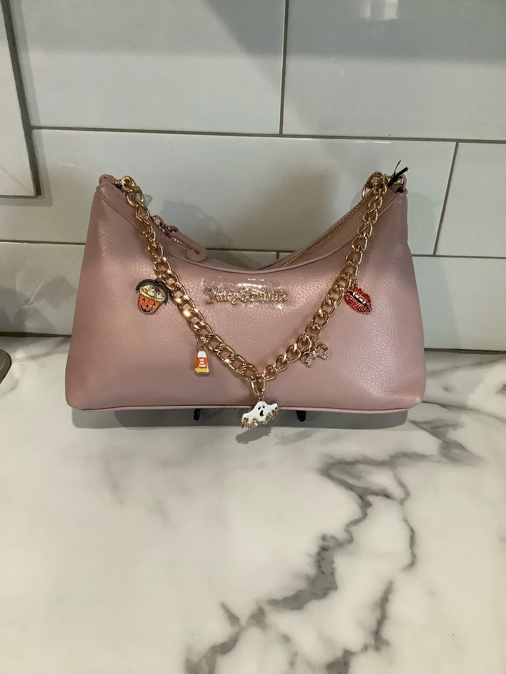Juicy Couture Dusty Pink Leather Shoulder Bag with Gold Halloween Charm Chain